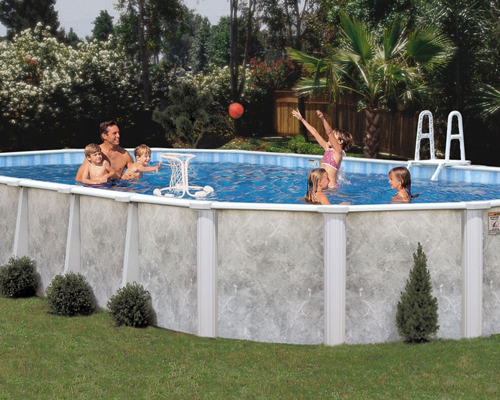 family playing in above ground pool