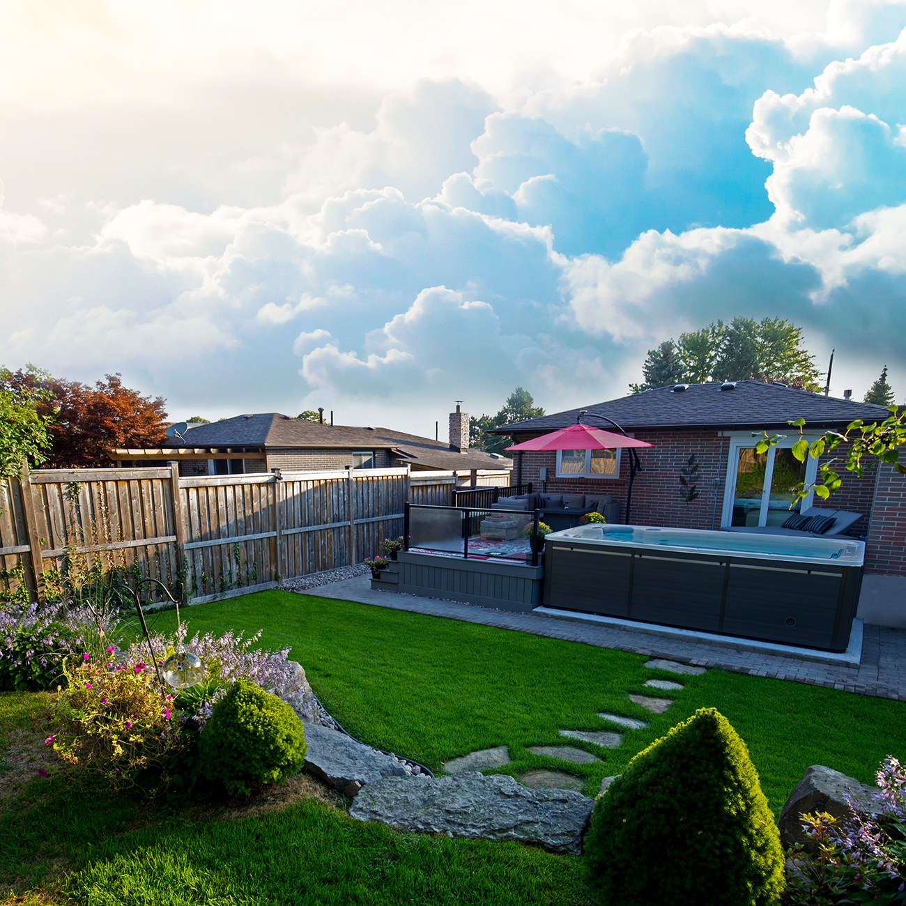 A yard with a swim spa.